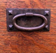 Original hand hammered hardware and pyramid screws.
